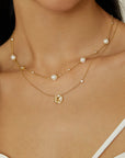 Gold Shell Pearl and Star Station Necklace
