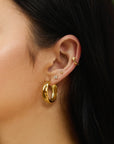 Gold Four-Petal Stud Earrings