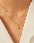 Gold Triple Shell Pearl Station Necklace