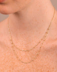 Multi-strand necklace with double cable chain and diamond-cut elements in 9ct Yellow